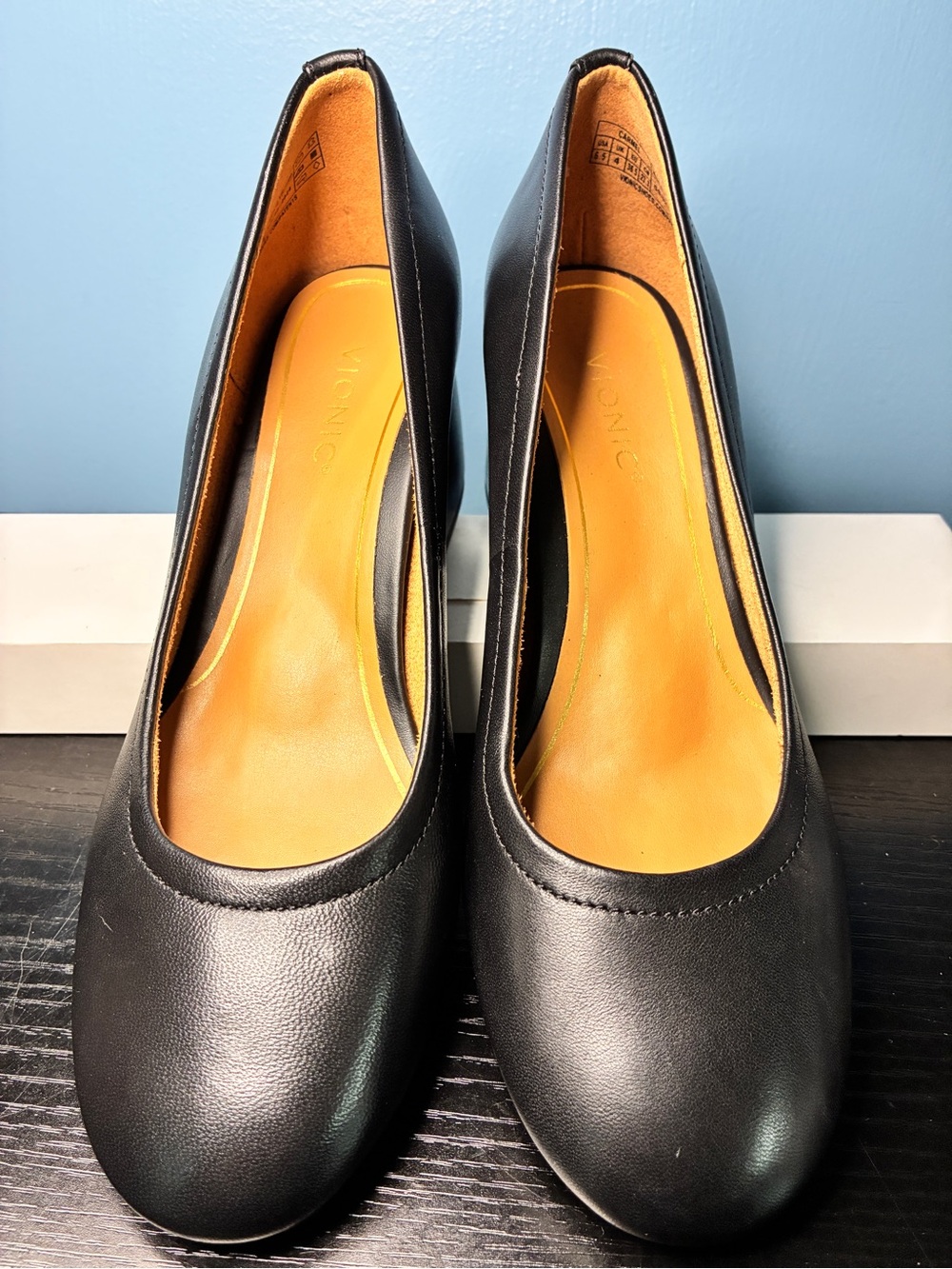 Vionic Black Rounded-Toe Leather Pumps with Tan Insole